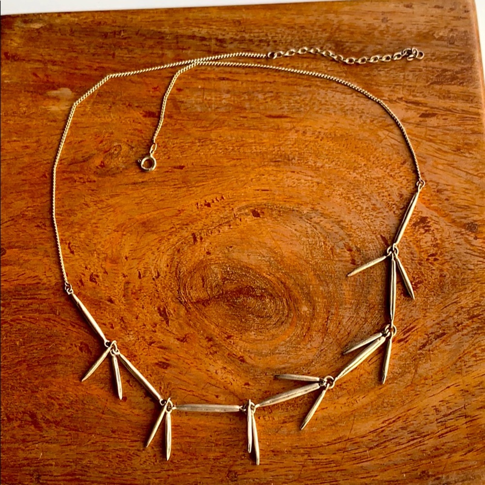 Delicate silver spike necklace.